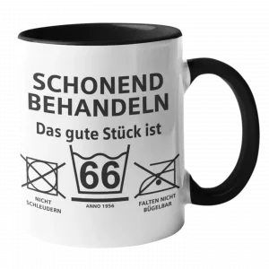 Weiße Keramiktasse mit schwarzem Henkel und dem humorvollen Spruch „Schonend behandeln“ – augenzwinkernde Botschaft über den respektvollen Umgang mit Menschen